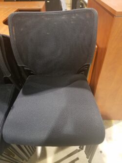 Used Armless Guest chair with Black mesh back