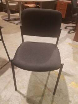 Pre-owned OTG armless guest chair in Black fabric